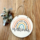 Welcome amazing things happen here hanging circle sign