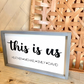This is us listed family names with heart wood family sign